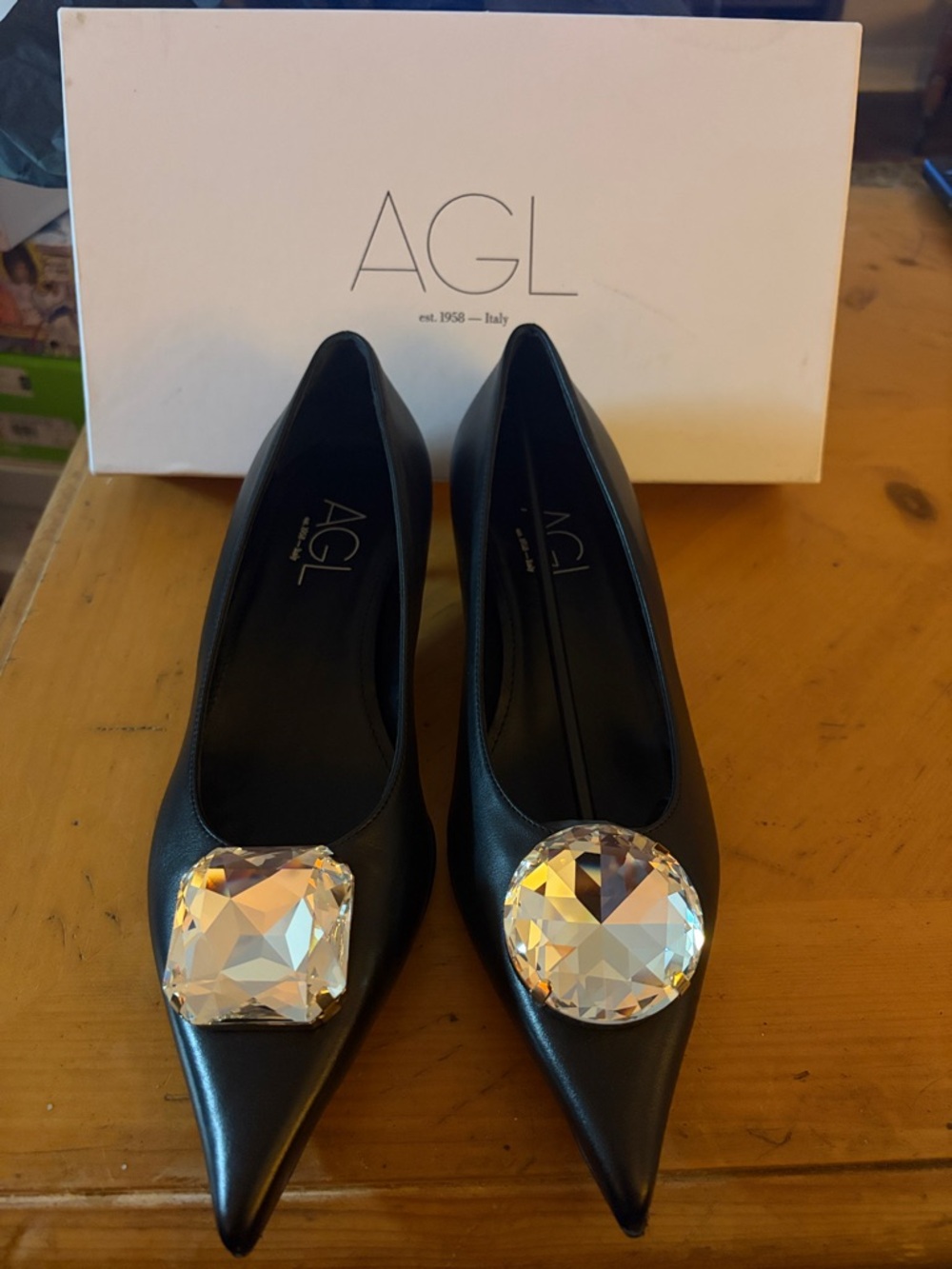 AGL Black Pointed Toe Pump with Oversized Crystal Accent